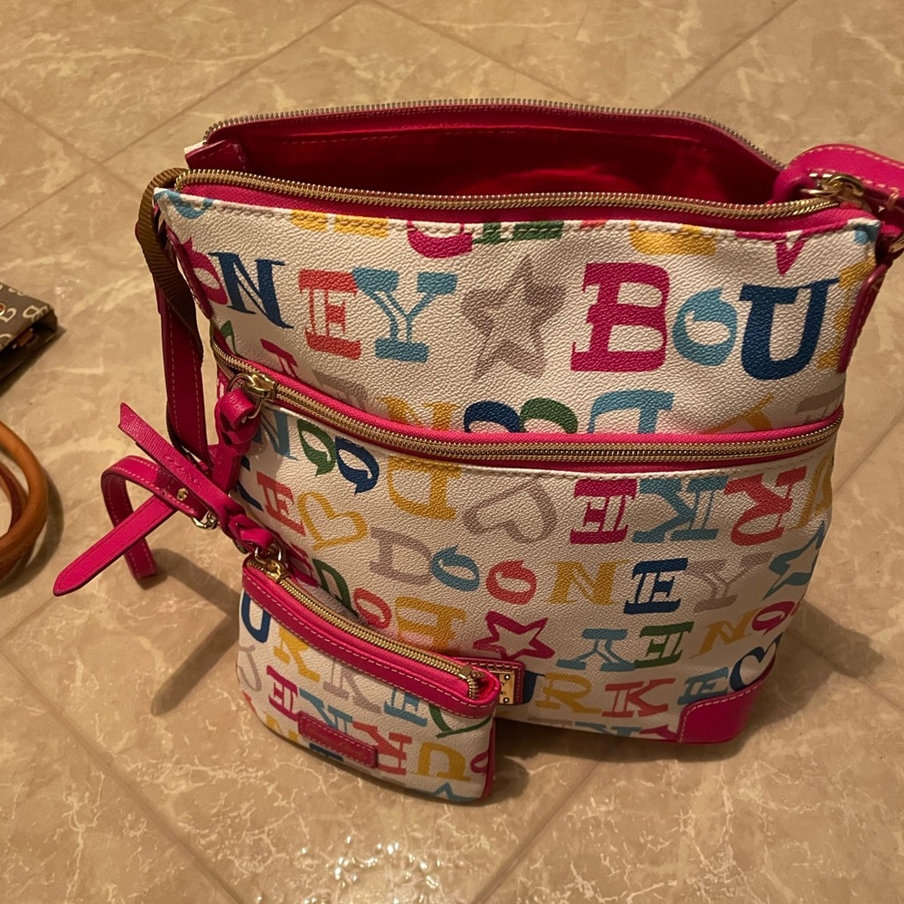 Pink Dooney and Burke Crossbody with matching wristlet